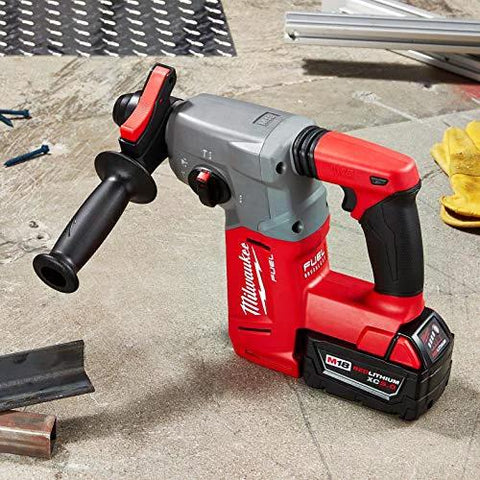 18V cordless brushless SDS Plus rotary hammer for drilling and chiseling concrete and masonry on a workshop floor