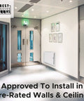 18x18 Insulated Fire Rated Metal Access Door With Flange installed in a fire-rated wall of a modern building corridor