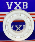 6206 Full Ceramic Bearing 30mm Bore with zirconia balls and PTFE cage, front view against VXB box background.
