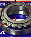 Close-up of VXB single-row tapered roller bearing with 80 mm bore, 140 mm outer diameter, chrome steel cage.