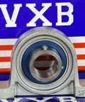 15mm Bore Miniature Stainless Steel Pillow Block Mounted Bearing displayed against a blue and red background.