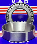 HM801349/HM801310 Tapered Roller Bearing 1-19/32" x 3-1/4" x 1-5/32" inch cone and cup set on blue background