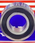 W205PP Bearing 25mm x 52mm x 13/16" inch - Sealed Ball Bearing, chrome steel, rubber sealed, front view on colored background