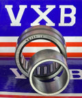 Close-up of NKI20/16 Needle Roller Bearing 20x32x16mm, displayed against VXB backdrop, showing machined parts and details.