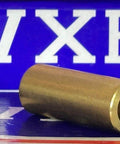 5/16" x 1/2" X 1-1/4" Bronze Bushing Plain Sleeve Bearing close-up on blue background