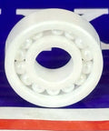 R4 Full Complement Full Ceramic Bearing 1/4" x 5/8" x 0.196" ZrO2 Bearing on a blue and red background
