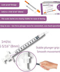 1 mL Syringes 31G 8mm Orange Cap 100 Count Box for precise dosing with smooth plunger and clear scale shown in use