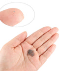 Person holding 1mm Precision Bearing Balls in 304 Stainless Steel G100 Grade 500 Count Pack for Precision Machinery and DIY Tinkerers by Uxcell
