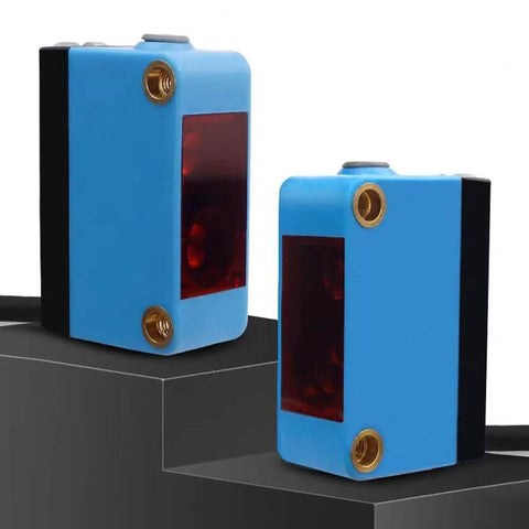 2-Pack BGX-35N background-suppressing photoelectric switch with 10-450 mm range, 12-24 VDC, blue casing, on display.
