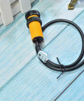2 Pack Infrared Photoelectric Sensor Module E18 D80NK with adjustable range shown on a wooden surface