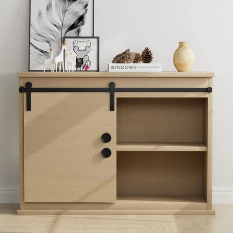 Closet with sliding door featuring 2-inch round black finger pulls, showcasing matte black finish against a light wood cabinet.