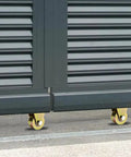 10 Pack 2 Inch Sliding Gate Wheel with V Groove Track Steel Rollers installed on metal gate for driveway