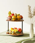 12 Inch Wood Lazy Susan Two Tier Rotating Spice Rack Turntable Organizer with fruits, rustic brown, on kitchen table