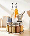 2-Tier Lazy Susan Spice Rack Organizer for Cabinet and Pantry, Stainless Steel, 10.5 Inch Diameter, on kitchen counter with spices