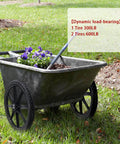20 Inch Flat Free Tire Cart Wheels Replacement installed on a garden cart with flowers, solid rubber wheels for heavy duty use.