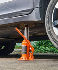 Heavy Duty 20 Ton Hydraulic Bottle Jack With 7.5 To 14 Inch Lift Range All Welded Construction Three Section Long Handle lifting SUV