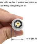Close-up of 20mm diameter brass shower door wheel with nylon roller and ball bearing, held in hand.