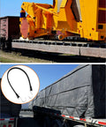 21 Inch Tarp Straps With Hooks 50 Pack Adjustable Rubber Bungee Tie Downs securing cargo on flatbed trailer, close-up view
