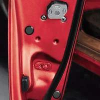 Caplugs Half Inch Flush Mount Hole Plug Black Plastic with Flush Button Head in red sheet metal automotive panel for easy installation