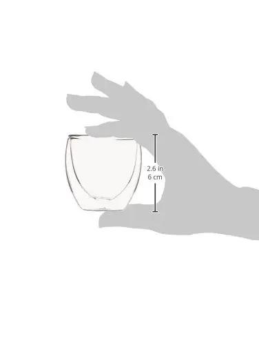 Real Deal Double Walled Espresso Glasses Set Of 2 Insulated Borosilicate Shot Cups Clear Heat Resistant Coffee Cup shown in hand