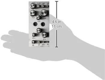 14 Piece Disc Cutter Set With Round Punch Sizes From Seven Sixty Fourth Inch To Five Eighth Inch shown on hand for scale