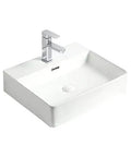 Modern White Rectangular Vessel Sink For Bathroom Counter with sleek chrome faucet and smooth ceramic finish.