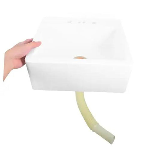 Wall-Mounted Bathroom Sink - Space-Saving Plastic Wash Basin for Small Restrooms, No-Drill Installation seen from the side with a hand holding it.
