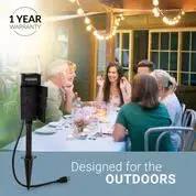Tough As Nails Garden Timer Stake With 6 Grounded Outlets Waterproof Timer managing outdoor lighting for a dinner party.