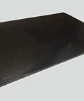 UHMW PE Black Sheet 1/4 Inch Thick 24 By 36 Inches Built To Last Durable Wear Resistant Plastic Panel for industrial use, angled view