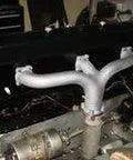 Rock Solid Stainless Steel Infused Inorganic Coating For Heavy Duty Boiler And Furnace Corrosion Control Up To 1400 Degrees Fahrenheit In A Straight Five Gallon Pro Ready Drum applied on engine components.