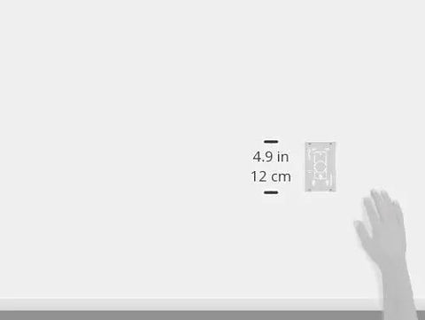 Hella Solid Single Gang Surface Mount Electrical Backbox White Housing One Point Four Five Inches shown on a wall with measurement labels.