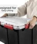 Person lifting Two Pack Heavy Duty Plastic Storage Bins Thirteen Point Five Gallon Gasket Totes With Airtight Silicone Seals Rock Solid for garage.