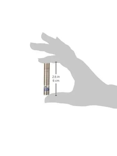Hand holding Universal Inductive Proximity Sensor With Tough Metal 12 mm Barrel And M12 Connector 3 Wire DC PNP Wiring PNP Input Normally Open Output Multi Function Industrial Sensor For Machinery Automation And Robotic Systems Plug And Play Ready, showing 6 cm length