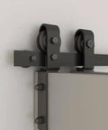 Close-up of sliding hardware from Walnut Stained DIY Wood Double Bi Fold Barn Doors With Sliding Hardware Kit, 72 By 84 Inches