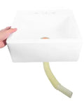 Wall Mount Sink - Lightweight Plastic Basin for Small Bathrooms, Easy No-Drill Installat, held with drainage hose visible.
