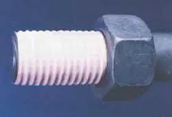 Threaded pipe coated with Three Quarters Inch Nickel Guard Antiseize Thread Sealing Tape Pro Grade PTFE Nickel Blend, side view