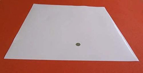 Virgin PTFE Sheet One Thirty Second Inch Thick Twenty Four By Twenty Four Inch Rolled For Convenience on red background