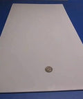 Virgin PTFE Flat Sheet One Eighth Inch Thick By 12 By 24 Inches, nonstick, chemical resistant material with coin for scale