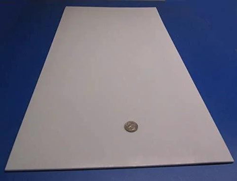 Virgin PTFE Flat Sheet One Eighth Inch Thick By 12 By 24 Inches, nonstick, chemical resistant material with coin for scale
