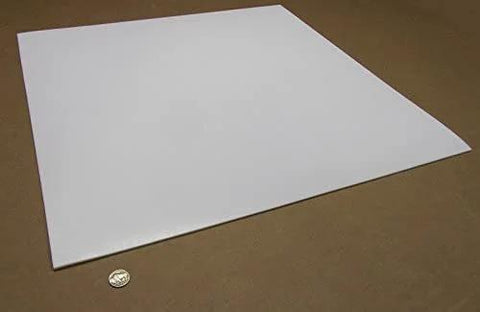 Virgin PTFE Sheet One Eighth Inch Thick By Twenty Four Inch By Twenty Four Inch Industrial Grade High Purity on brown surface.