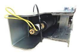 Demco DA70 surge brake actuator with solenoid, front view showing mounting bracket and yellow and black wires