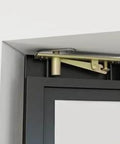 Close-up of pivot hinge and black steel frame on 36 In By 84 In Full Lite Opaque Frosted Glass Interior Pivot Door With Black Steel Frame And Pivot Hinge Hardware Kit Slick Frameless European Style Office Door For Modern Commercial Spaces.