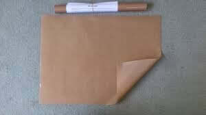 PTFE Teflon Nonstick Sheet Roll 39 Inch By 10 Yard, 5 Mil Thick Craft Mat displayed unrolled with roll behind it