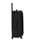 Side view of Briggs & Riley expandable spinner luggage with 360° wheels and black softside design, ideal for travel.