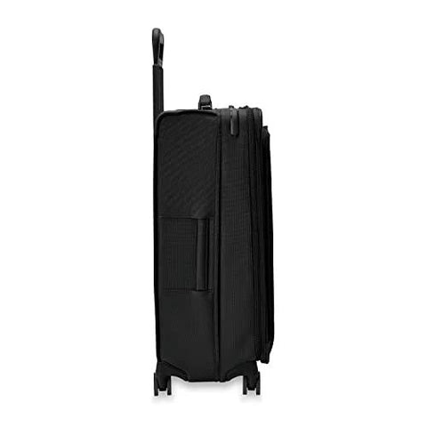 Side view of Briggs & Riley expandable spinner luggage with 360° wheels and black softside design, ideal for travel.
