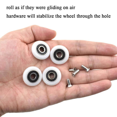 23mm diameter bearing steel shower door wheels with nylon rollers and stainless steel screws in hand, smooth installation parts