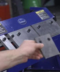 24 Inch Box And Pan Sheet Metal Brake With Five Adjustable Fingers for precision bends, close-up of metal sheet in use