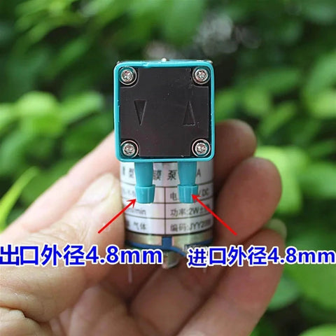 Close-up of 24V Mini Diaphragm Pump, 2W Micro Liquid Water Pump, Vacuum Air Pump With Negative Pressure Suction, hand-held view