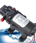 Workhorse Compact 24V Diaphragm Pump High Flow Five Liters Per Minute Self Priming Electric Water Pump with water splash.