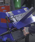 Person using 24 Inch Box And Pan Sheet Metal Brake With Five Adjustable Fingers For Small Shops Or Home Use in a workshop setting